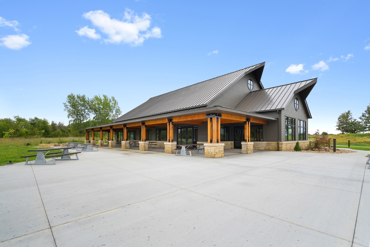 Patio with picnic tables and fire ring