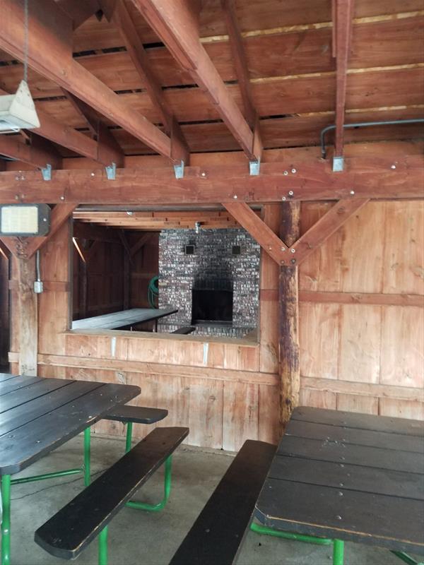 Interior of Big Sioux Shelter 2: View of serving window and fireplace on east wall