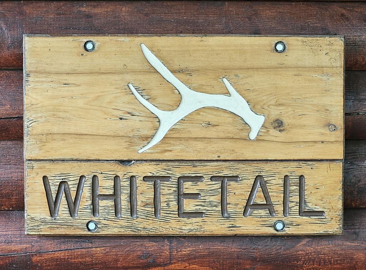 Whitetail - Wooden sign with the words "Whitetail".