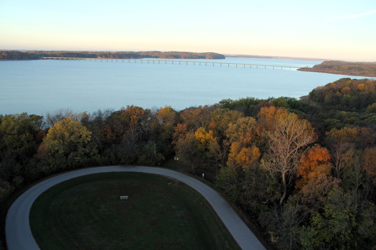 Overlooking the lake and mile long bridge with fall foliage in background from top of tower