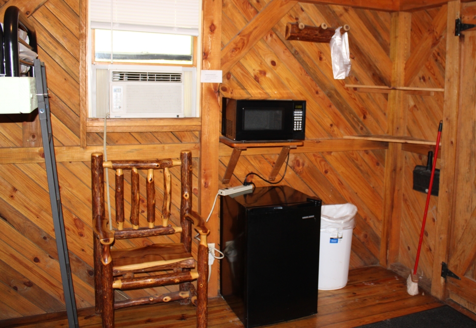 Fridge, Coat rack, trash can, extra chair