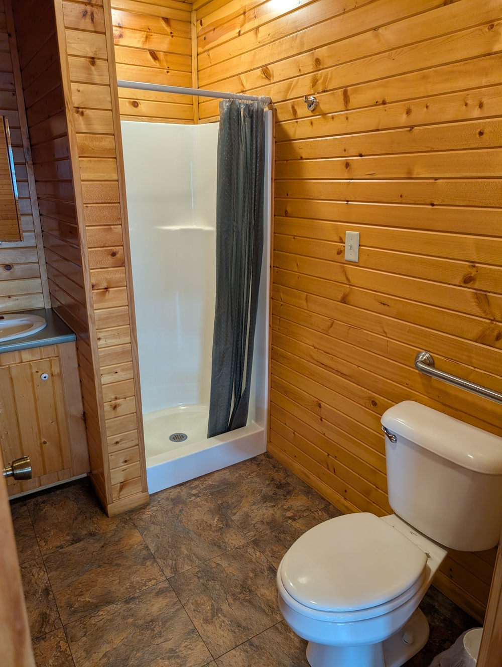 Bluegill Bungalow- restroom with shower stall.