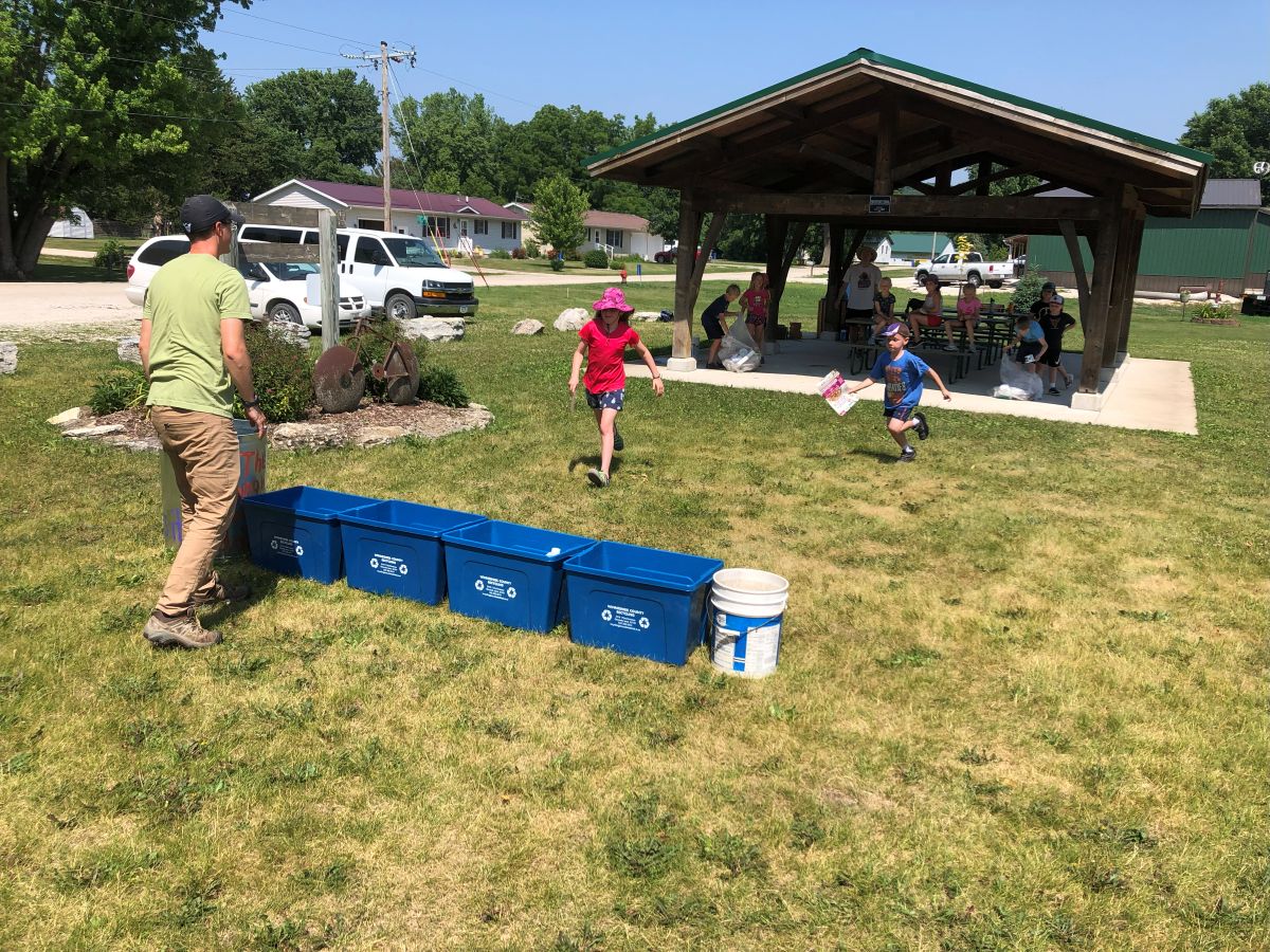 Summer campers play recycling games at Freeport shelter