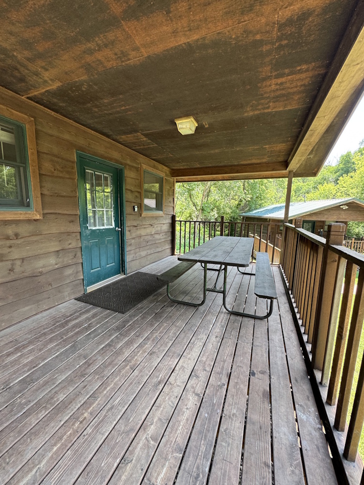 Front Porch: View of fron porched, covered area with picnic table