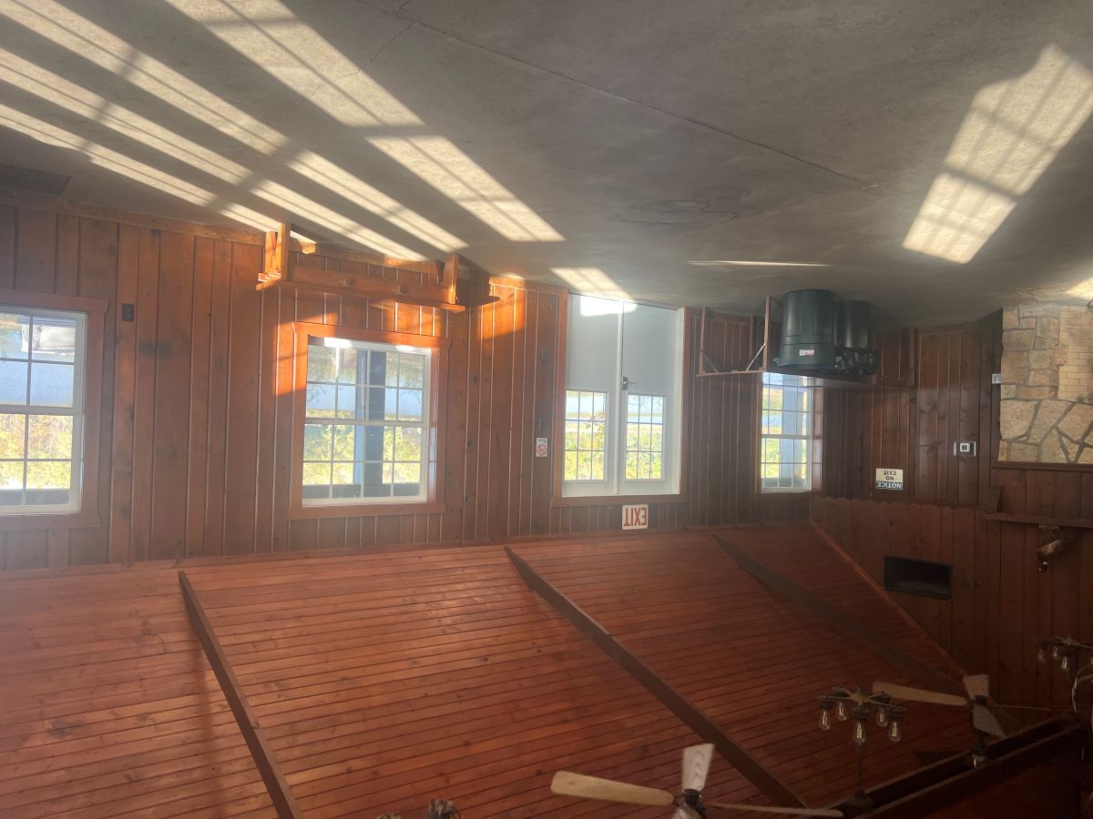 Mill Creek Lodge Main room with open area and restrooms