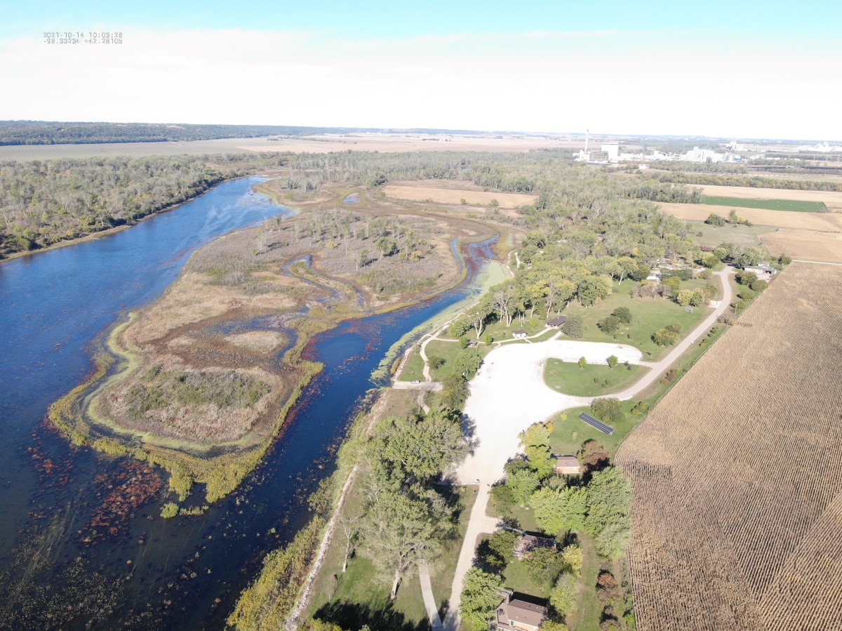 Aerial view of Snyder Bend Park showing the lake, cabins, open shelter and campground.
